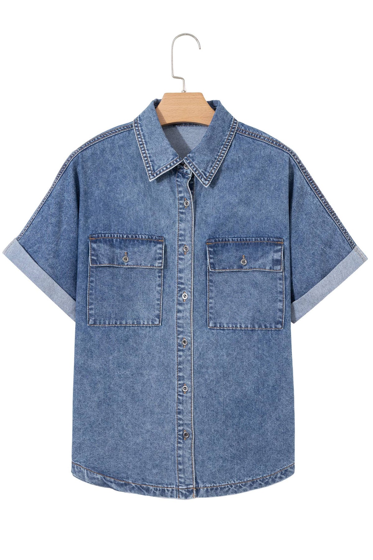 Blue denim short sleeve button-up shirt with two flap chest pockets on hanger