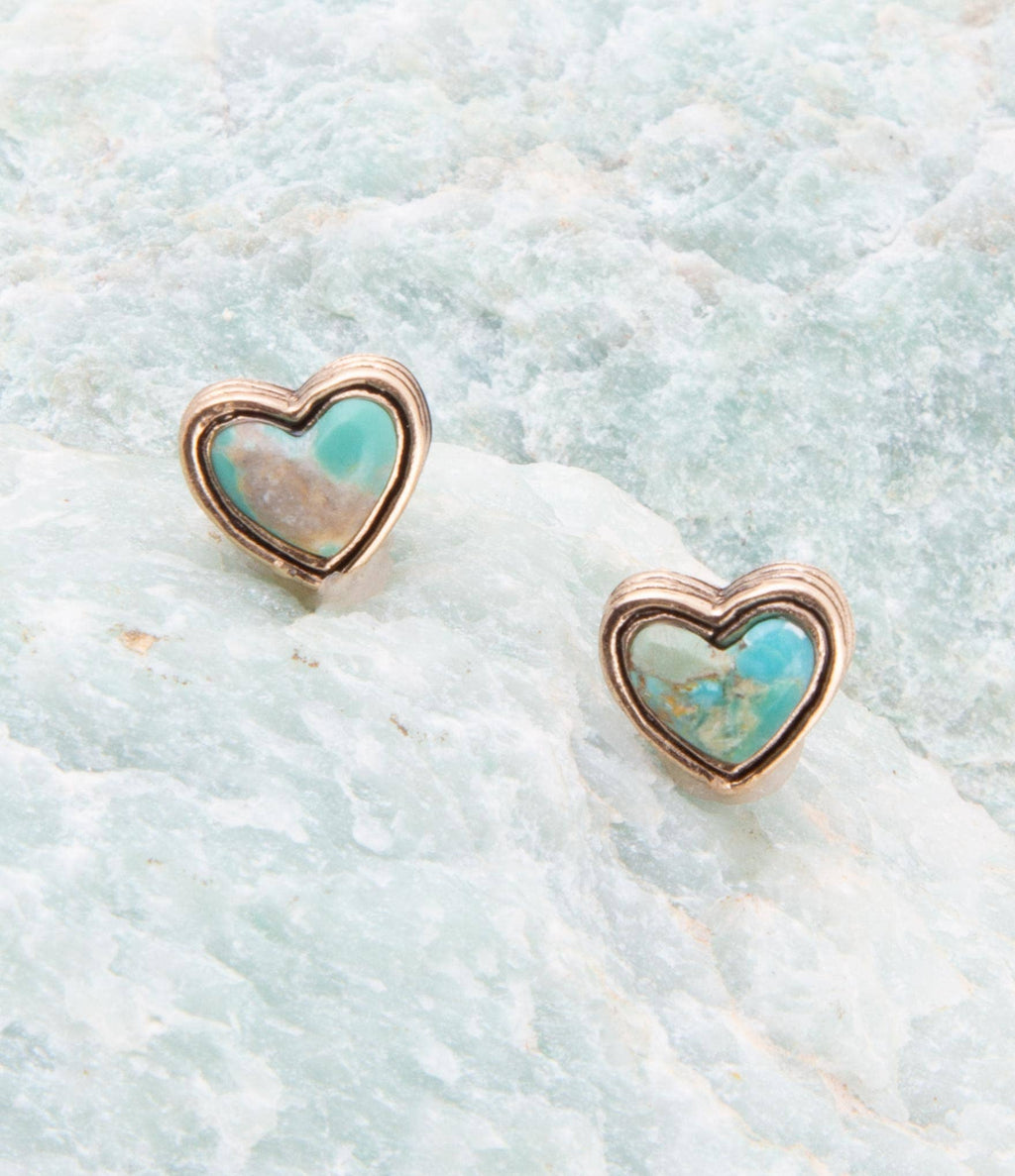 Pair of heart-shaped turquoise stud earrings with golden frames
