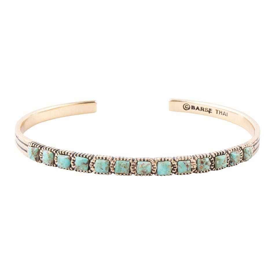 Turquoise and bronze cuff bracelet with oval inlays; inside reads BARSE THAI