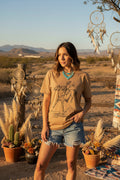 Tan crew-neck short-sleeve T-shirt with front graphic print