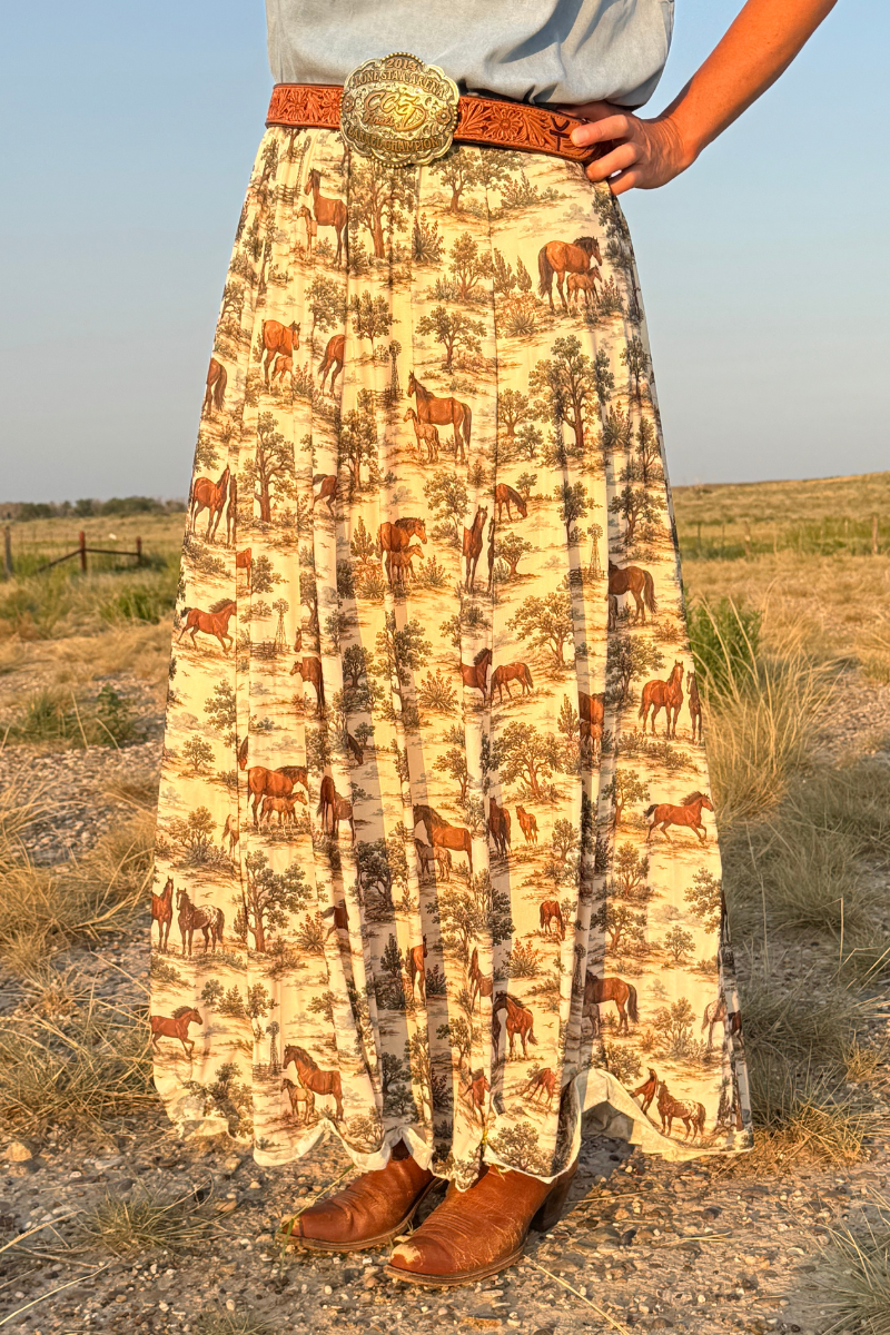 Tan flowy maxi skirt with desert safari animal print, gathered waistband and belt