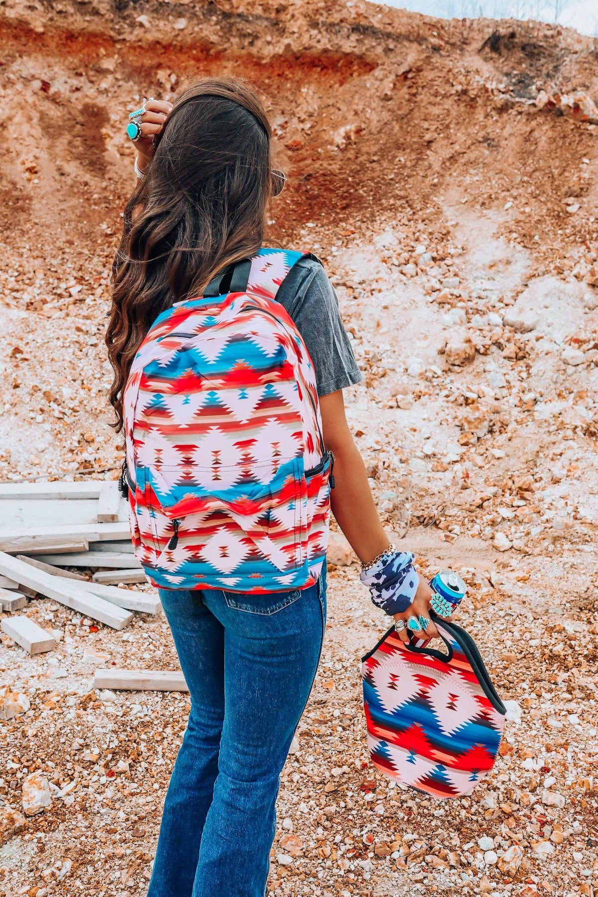 Aztec backpack with matching lunch tote, multicolor zigzag pattern, straps and tote in hand