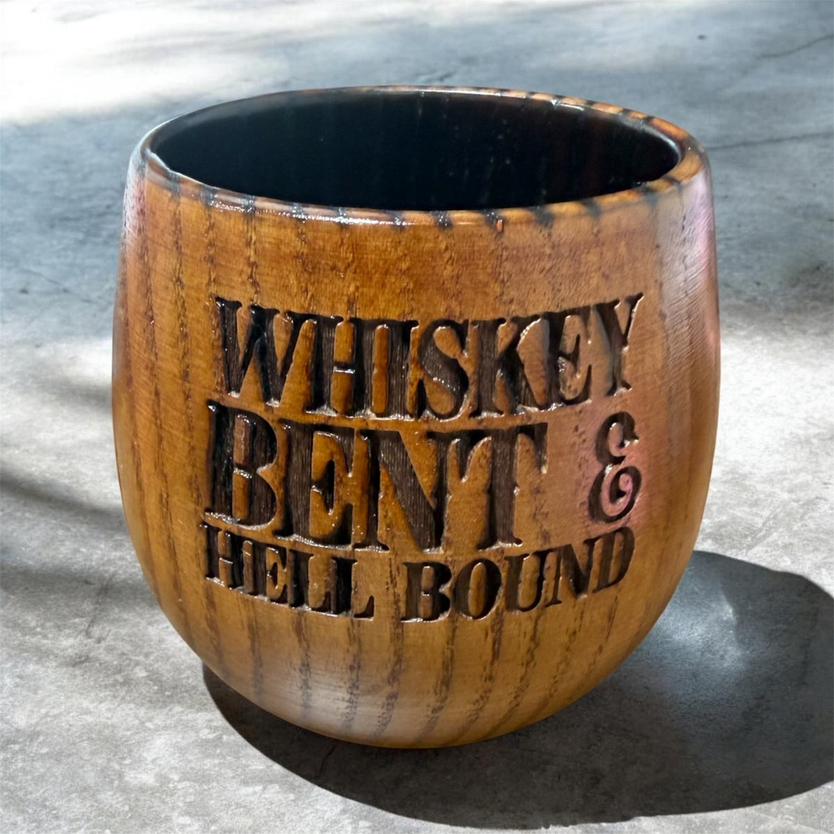 Burned wooden whiskey cup with 'WHISKEY BENNY HELL BOUND'